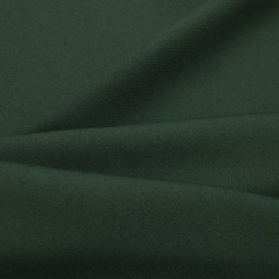 Ткань костюмная 21010 2076, 225 гр/м2, шир.150см, цвет т.зеленый - купить в Нефтекамске. Цена 390.73 руб.